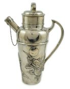 An early 20th century Japanese silver cocktail shaker, with embossed and applied dragon