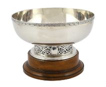 A George V Arts & Crafts silver circular bowl, by W & C Sissons, with Celtic revival border, on a