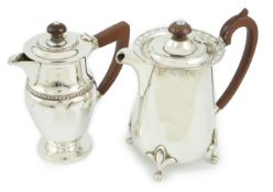 A George V silver hot water pot by Walker & Hall, Sheffield, 1925, and one other silver hot water