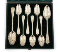 A Victorian cased set of six engraved silver dessert spoons and two serving spoons, by George Adams,