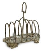 A Victorian silver seven bar toast rack, by Henry Holland, of oval form with loop handle and pierced