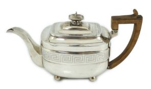 A George III silver shaped rectangular teapot, by Soloman Hougham,` with engraved Greek Key band,