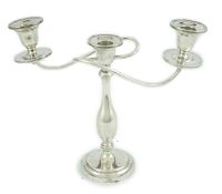 A George VI silver two branch, three light candelabrum, by William Adams Ltd, Birmingham, 1937,