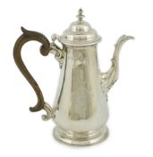 A George II silver coffee pot, possibly by William & Robert Peaston, of tapering form, with engraved