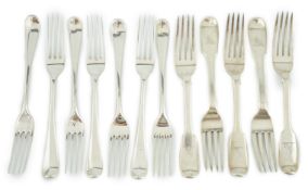 A set of seven George III silver Hanovarian pattern table forks, George Smith, London, 1776, 20.2cm,