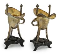 A pair of early 20th century Chinese archaistic silver 'Jue' wine cups, by Wang Hing, Hong Kong,