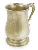 A George III silver baluster mug, by Fuller White?, with acanthus leaf capped scroll handle and