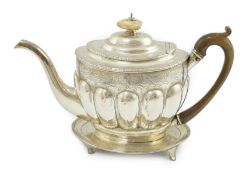 A George III engraved silver oval teapot by Soloman Hougham, together with a George III silver
