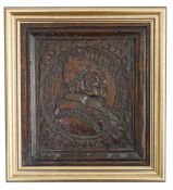 A 17th century oak panel carved with a relief portrait of Pope Alexander VII