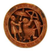 A Romanesque madder stained walrus ivory Tableman or gaming piece, Cologne, c.1140-1180 AD