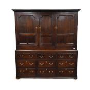 A mid 18th century oak press cupboard