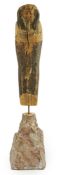 An Ancient Egyptian miniature wood statuette of Ptah-Sokar-Osiris, probably late Kingdom