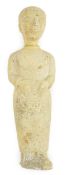 An unusual limestone votive figure, with cuneiform inscription, possibly Mesopotamian