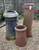 Three assorted terracotta chimney pots, largest height 90cm. Condition - weathered, some small chips