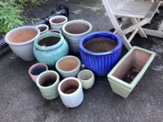 A collection of assorted glazed pottery garden planters including Heritage Garden Pottery, largest