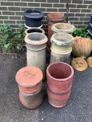 Eight assorted pottery chimney pots, largest height 70cm. Condition - all weathered, some minor