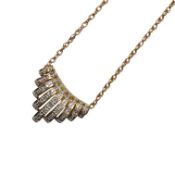 A yellow metal and diamond chip set fan shaped pendant, width 22mm, on a 375 chain, 40cm, gross 5.
