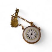 A lady's yellow metal mounted fob watch, with Roman dial and suspension chain with brooch, case