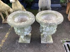 A pair of reconstituted stone garden urns, height 55cm and three assorted marble urns. Condition -