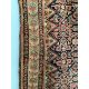 A Caucasian red ground rug, 192 x 129cm. Condition - faded and worn - Image 2 of 3
