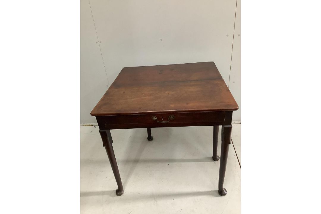 A George II mahogany folding tea table, width 81cm, height 73cm. Condition - fair to good - Image 2 of 2