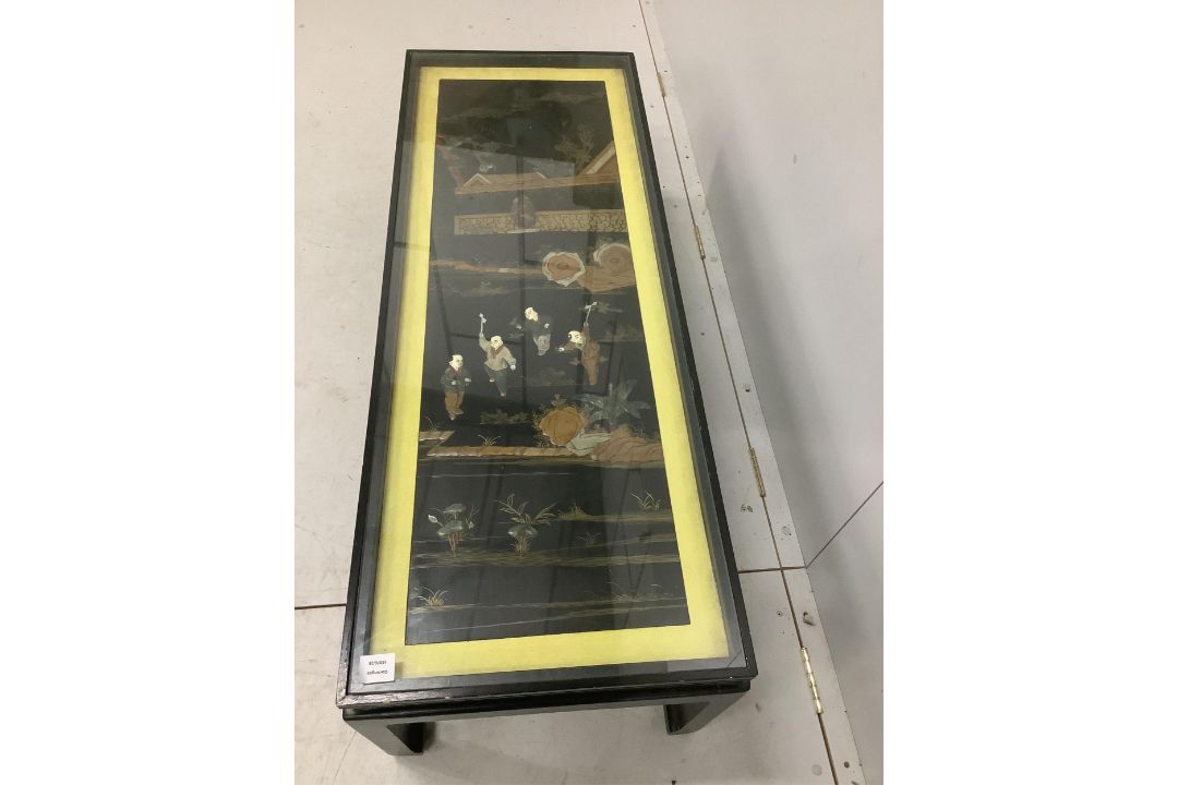 A Chinese ebonised table inset with a soapstone panel, width 132cm, depth 50cm, height 41cm. - Image 2 of 2