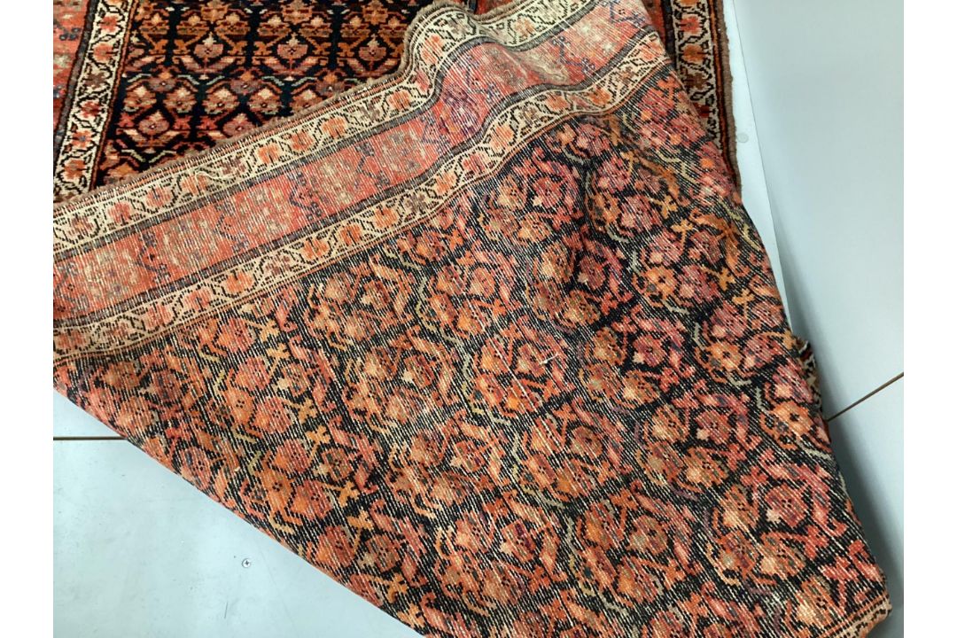 An Afshar blue ground runner woven with rows of floral devices, 354cm x 107cm. Condition - fair to - Image 2 of 2