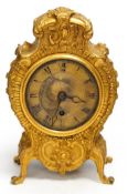 J. Lamb, 86 Newman Street. A William IV ormolu mantel timepiece, in heavy scrollwork case with