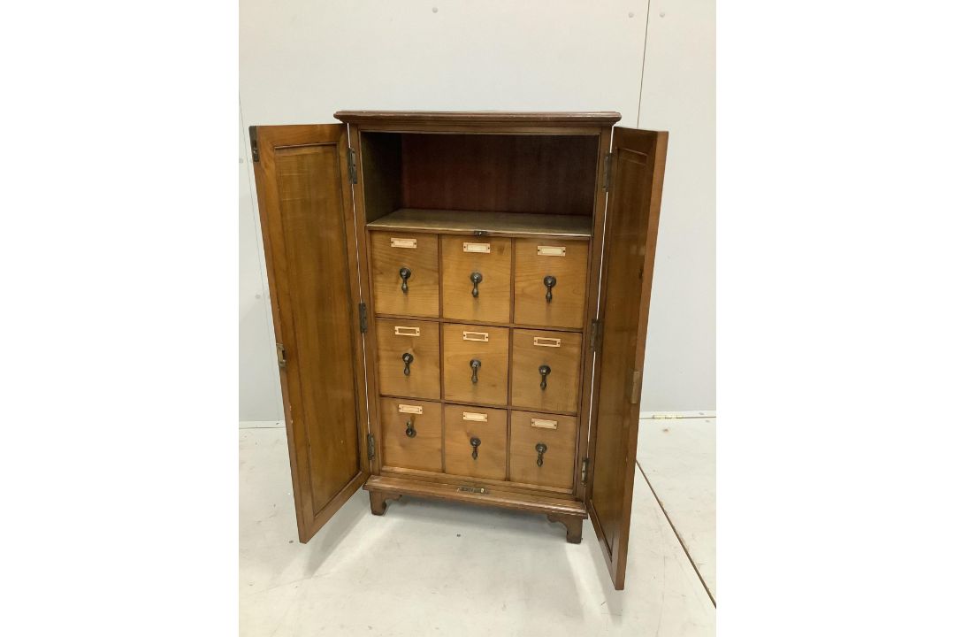 An early 20th century walnut office cabinet fitted with nine deep drawers, width 61cm, height 106cm. - Image 2 of 5