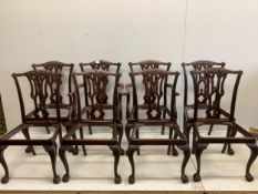 A set of eight Edwardian Chippendale style carved mahogany dining chairs (two arm, six single).