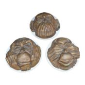 A set of ‘three wise monkeys’ plaster plaques, signed Alfred R. Martin, 22.5cm. Condition - fair
