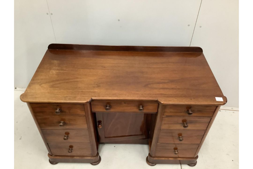 A Victorian mahogany kneehole desk, fitted nine small drawers, width 125cm, height 78cm. Condition - - Image 3 of 3