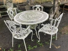 A Victorian style painted aluminium circular garden table, diameter 106cm, height 70cm and four