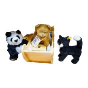 A modern Sri Lankan wood Noah's Ark and animals, a Steiff black cat and panda and another soft toy