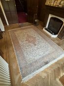 An Isfahan ivory ground rug woven with design, 320 x 215cm. Condition - fair to good