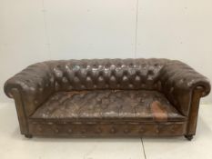 An early 20th century buttoned brown leather Chesterfield sofa, width 200cm, depth 90cm, height