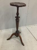 A rare early 18th century maple and burr maple veneered torchere stand, the tripod base with unusual
