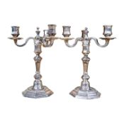 A matched pair of Christofle Cluny-design silver plated three arm candelabra, 28cm. Condition -
