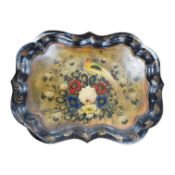 A 19th century japanned toleware tray, painted with a pheasant and flower decoration, 77cm wide.