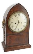 A Regency ebony strung mahogany bracket clock, lancet case and painted Roman dial, twin fusee