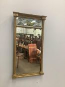 A Regency giltwood and composition pier glass, width 44cm, height 80cm. Condition - fair