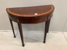 An Edwardian inlaid mahogany demi lune card table, width 91cm, height 73cm. Condition - top