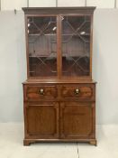 A George IV mahogany secretaire bookcase, width 118cm, depth 59cm, height 220cm. Condition - fair to