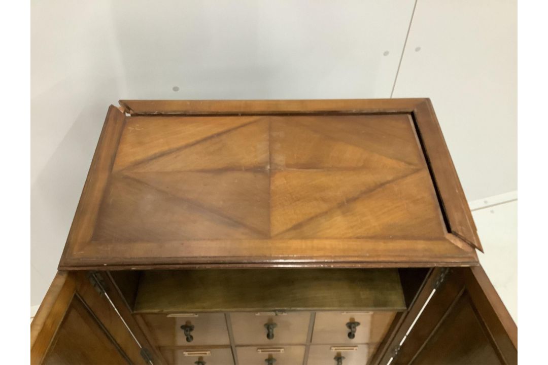 An early 20th century walnut office cabinet fitted with nine deep drawers, width 61cm, height 106cm. - Image 5 of 5