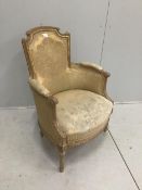 A Louis XV style carved giltwood and composition fauteuil, width 66cm, depth 52cm, height 90cm.