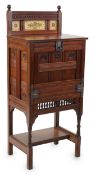 A Victorian Aesthetic Period walnut fall front desk attributed to Bruce James Talbert (1838-1881),