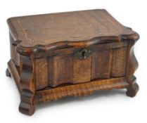 An early 18th century Dutch walnut casket with inlaid banding, serpentine front and base drawer,