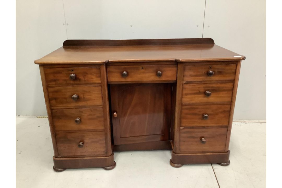 A Victorian mahogany kneehole desk, fitted nine small drawers, width 125cm, height 78cm. Condition - - Image 2 of 3