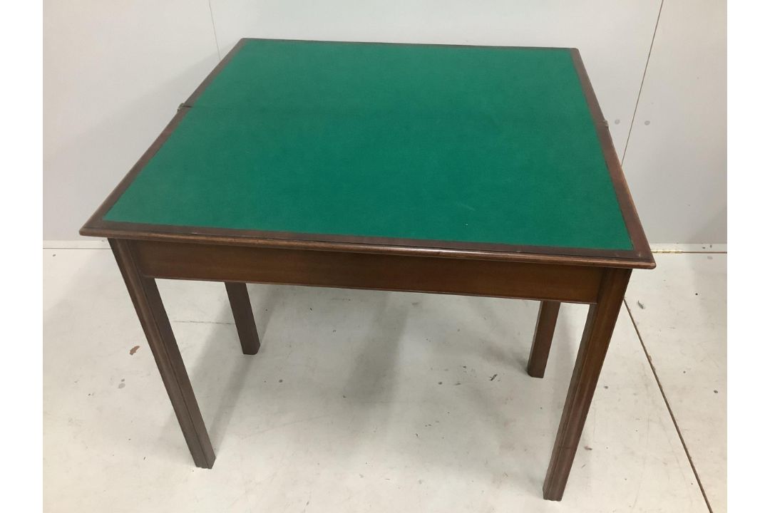 A George III rectangular banded mahogany folding card table, width 91cm, depth 45cm, height 76cm. - Image 2 of 2