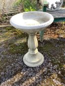 A Sparta Statues reconstituted stone pedestal bird bath, height 58cm, a more ornate larger bird
